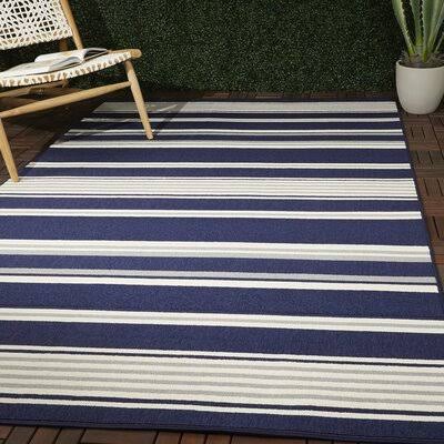 Anzla Striped Blue/Beige Indoor / Outdoor Area Rug Sand & Stable Rug Size: Rectangle 7&10x22 x 10&