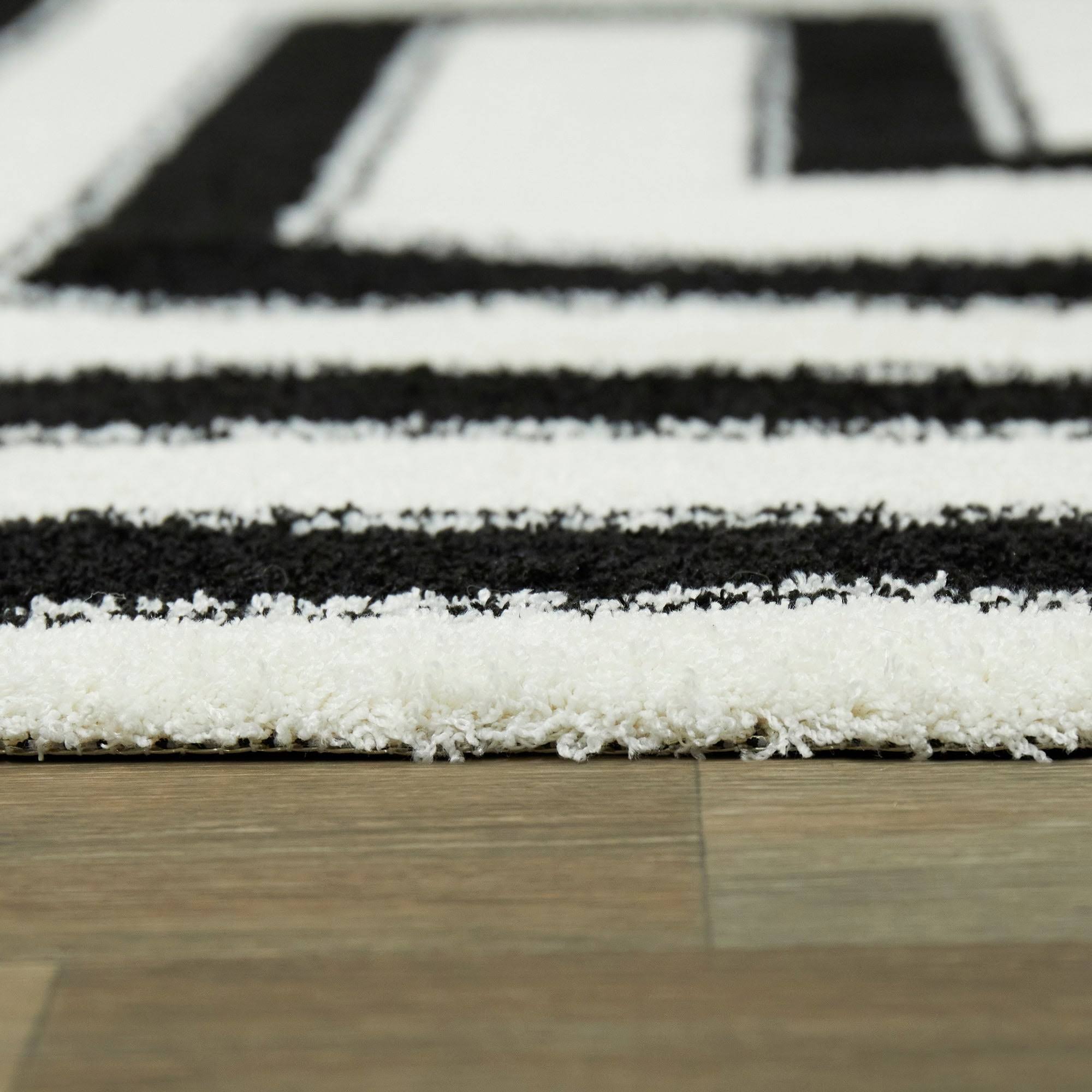 BALTA Vincent Black 5 ft. x 7 ft. Art Deco Area Rug