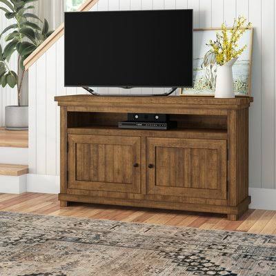 Pineland TV Stand for TVs Up to 70x22 Color: Distressed Pine, Width: 54x22
