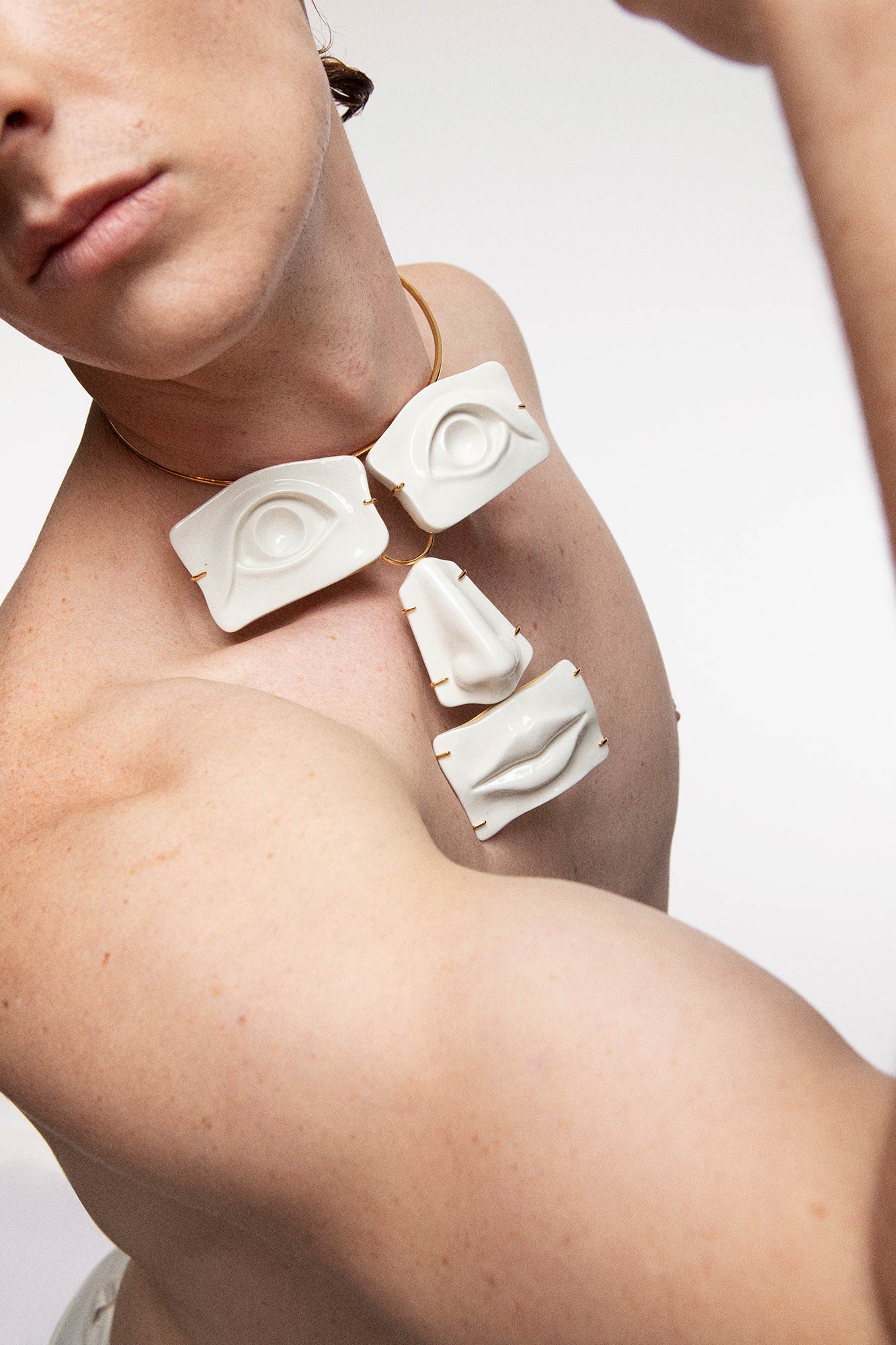 FACE STATEMENT NECKLACE