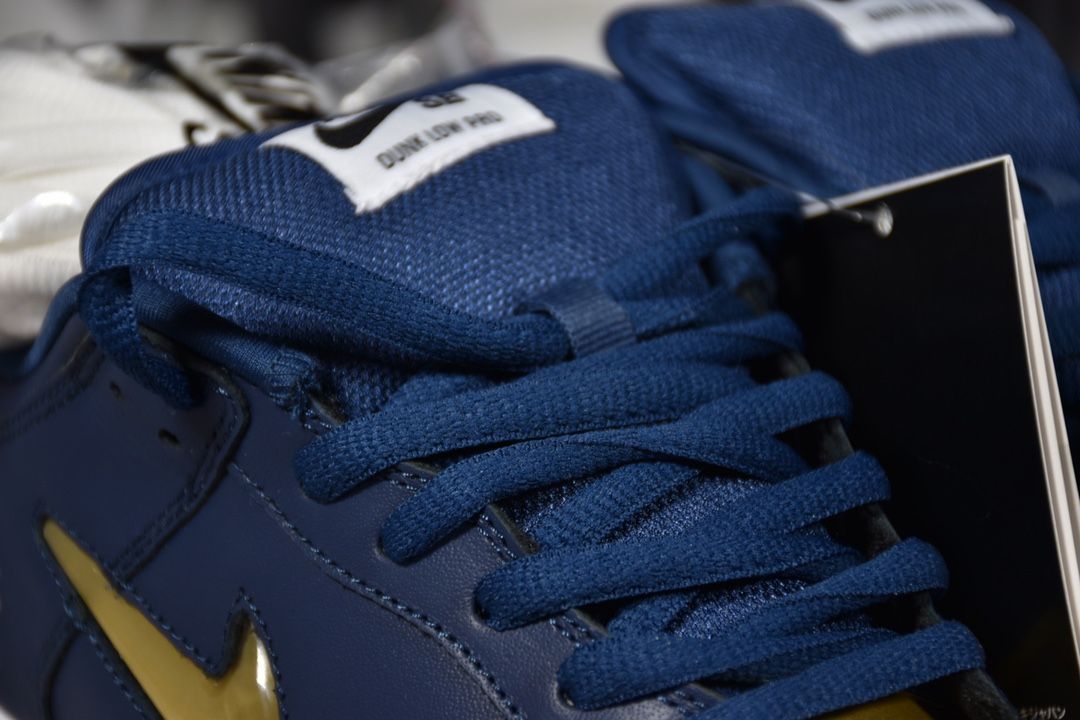 Nike SB Dunk Low Supreme Jewel Swoosh Gold